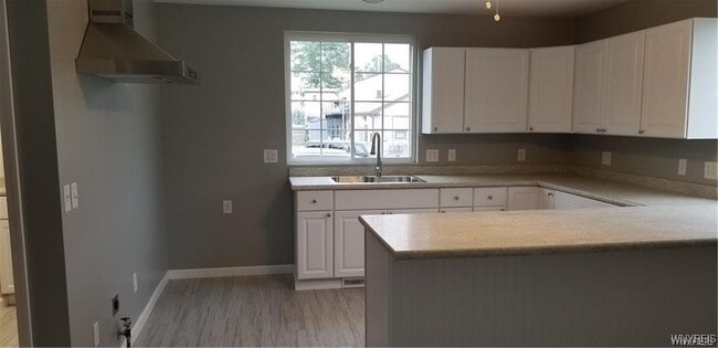 Building Photo - 8137 Sheridan Dr