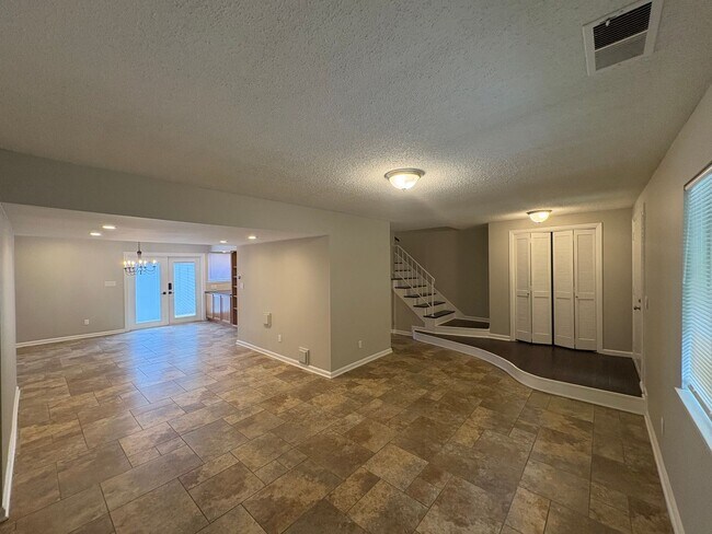 Building Photo - Four Bedroom Townhome Available Now