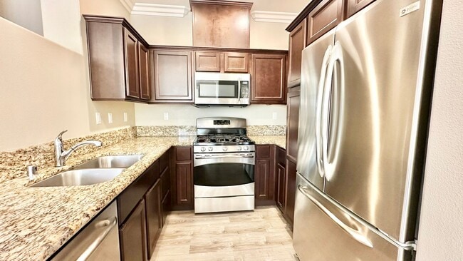 Building Photo - Beautiful, Newer, Townhome with Attached 2...