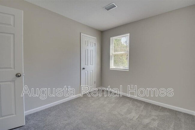 Building Photo - 2317 Woodsman Dr