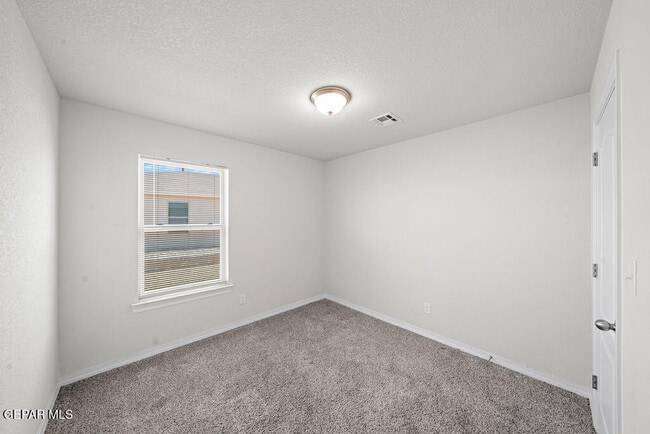 Building Photo - 14573 Banana Yucca Ave