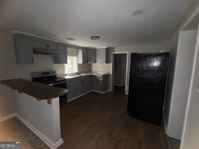 Building Photo - 1206 E Roosevelt Ave