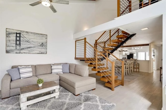 Building Photo - Spacious 1,550 Sq Ft Townhome | 2-Car Garage & High Ceilings w/ Exposed Beams