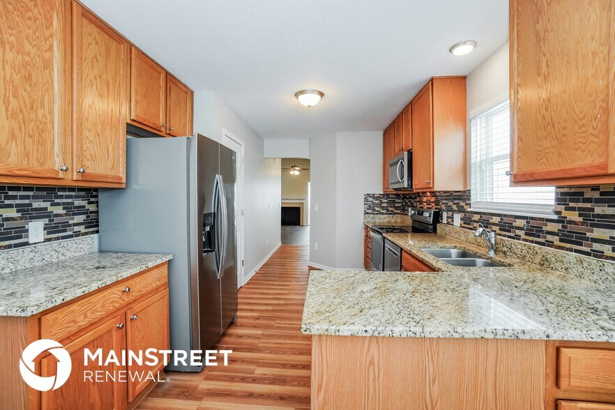 Building Photo - 6927 Spring Bloom Dr