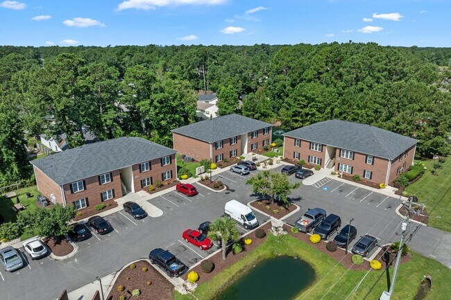 Building Photo - No "BAH HUMBUG" fees here! Rents always include high speed internet, cable, water, sewer, trash &...