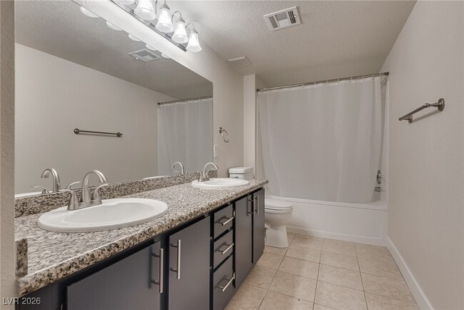 Building Photo - 5055 W Hacienda Ave