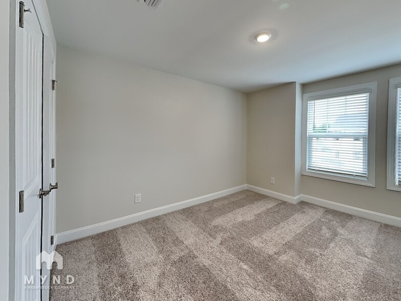 Building Photo - 6935 Woodland Stream Pl