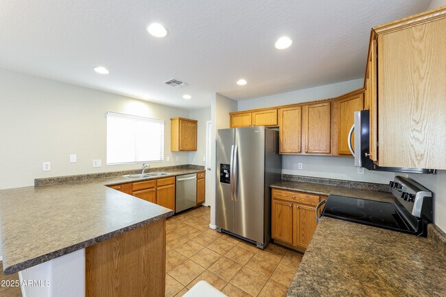 Building Photo - 6720 N 129th Ln
