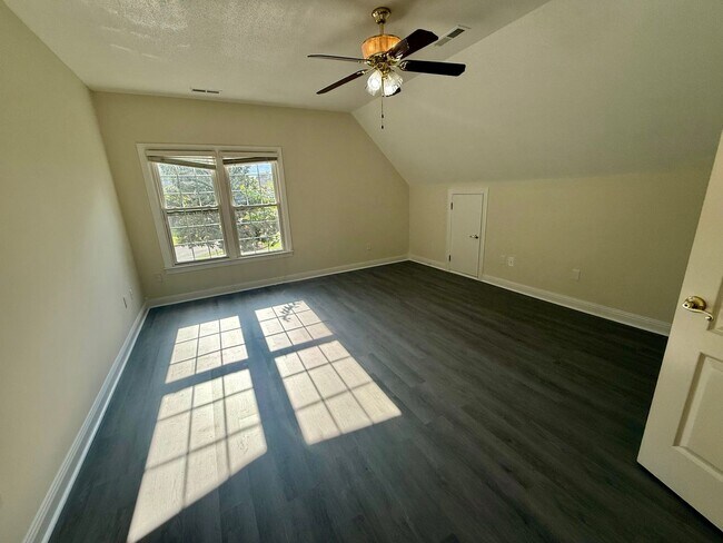Building Photo - Spacious 5-Bedroom Home on a Corner Lot in...