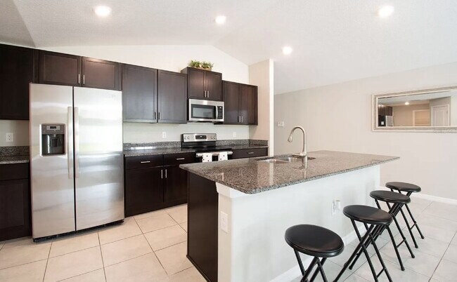 Building Photo - "Discover Spacious Comfort: 4-Bed, 2-Bath Gem in Riverview!"