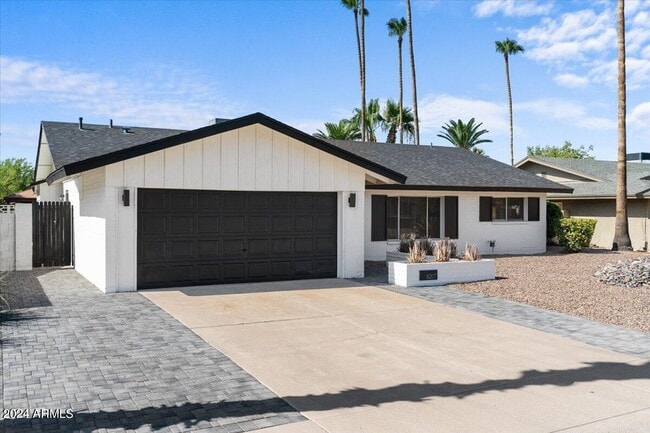 Building Photo - 8207 E Montebello Ave