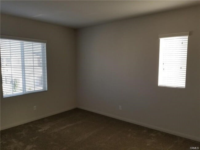 Building Photo - 7827 Wild Rye St