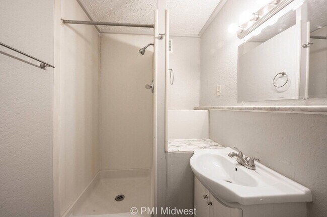 Building Photo - "Charming 1-Bedroom Retreat in Greenfield – Cozy 400 Sq Ft Haven!"