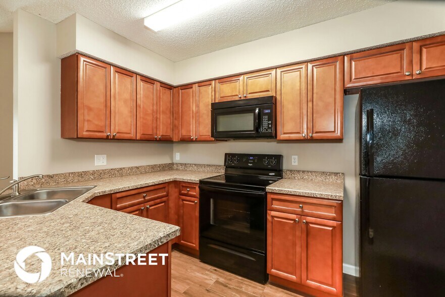 Building Photo - 9845 Paddlewheel Dr W