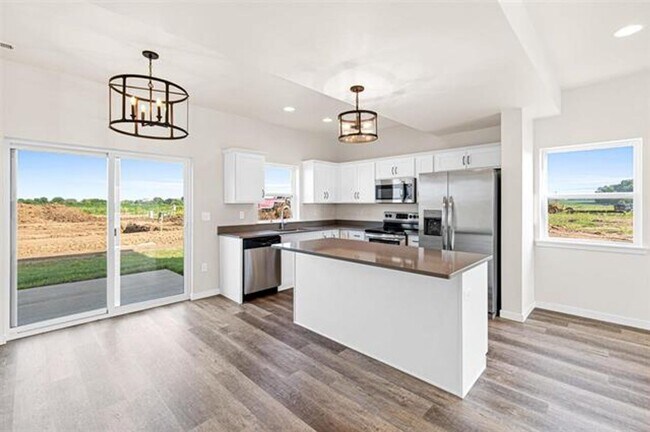 Building Photo - New Townhomes in a Convenient North Libert...