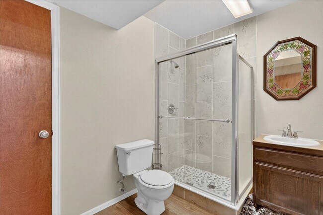 Building Photo - 4BR/4BA Updated Home with Finished Basement Suite & Landscaped Yard