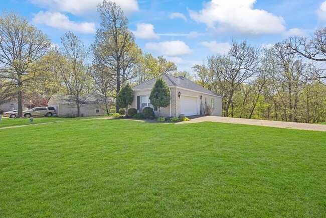 Building Photo - Spacious 3-Bedroom, 2.5 Bathroom Home in Woods Creek - Prime Bentonville Location