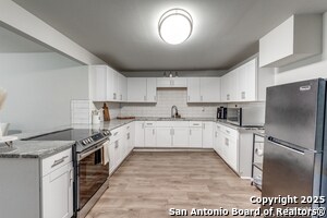 Building Photo - 5027 Blue Bonnet St