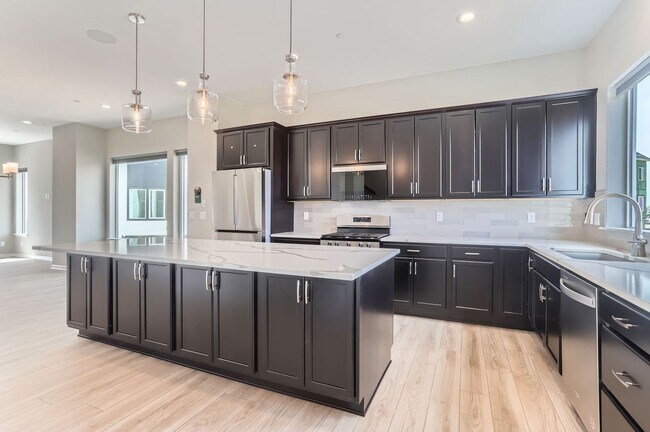 Building Photo - Brand New Build Three-Story Townhome in Er...