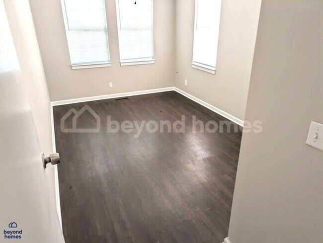 Building Photo - Updated Bungalow with Massive Deck and Fully Fenced Yard!