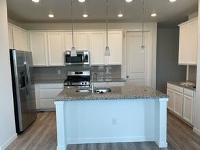 Building Photo - Spacious 4 Bed Townhome w/ 2-Car Garage in Erie – $1,000 Off 1st Month!