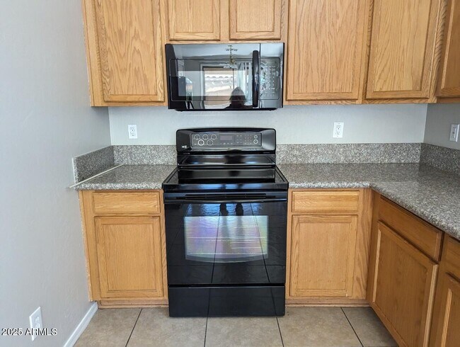 Building Photo - 1209 S Roger Way