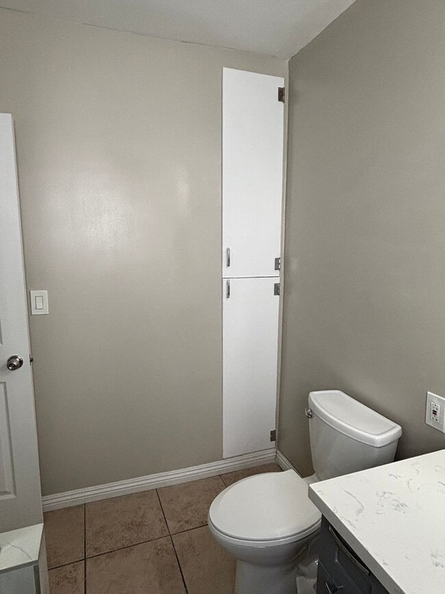 Building Photo - Cozy, Updated, and Pet-Friendly — Your New...