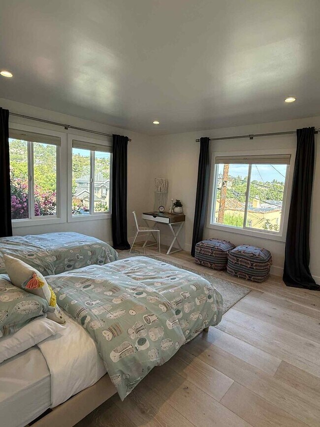Building Photo - Modern 4-Bedroom Retreat in San Carlos – Remodeled, Spacious, Private Yard