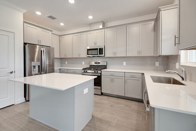 Building Photo - Stunning 4/3 in Gated Dora Parc! Water Views!