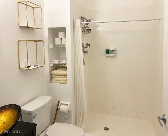 Building Photo - 25000 Tamiami Trl E