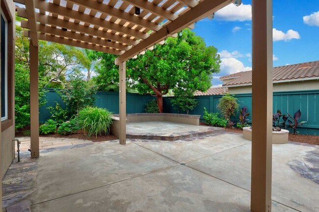 Building Photo - Gated corner lot home walking distance to the beach