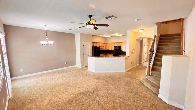 Building Photo - Charming 3-Bedroom Townhome in Oviedo – La...