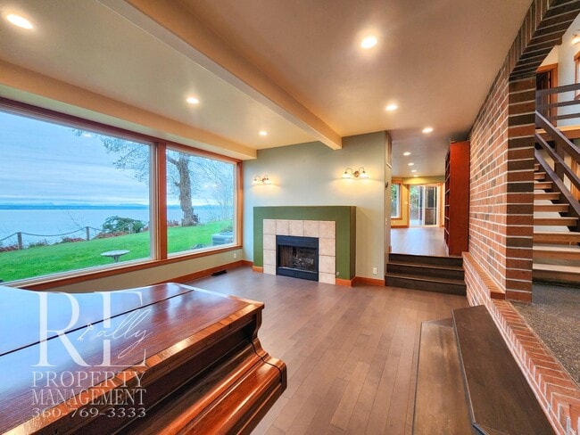 Building Photo - MOVE-IN SPECIAL: 50% OFF FIRST MONTHS RENT - Waterfront Rustic Retreat with Vaulted Ceilings, Pic...