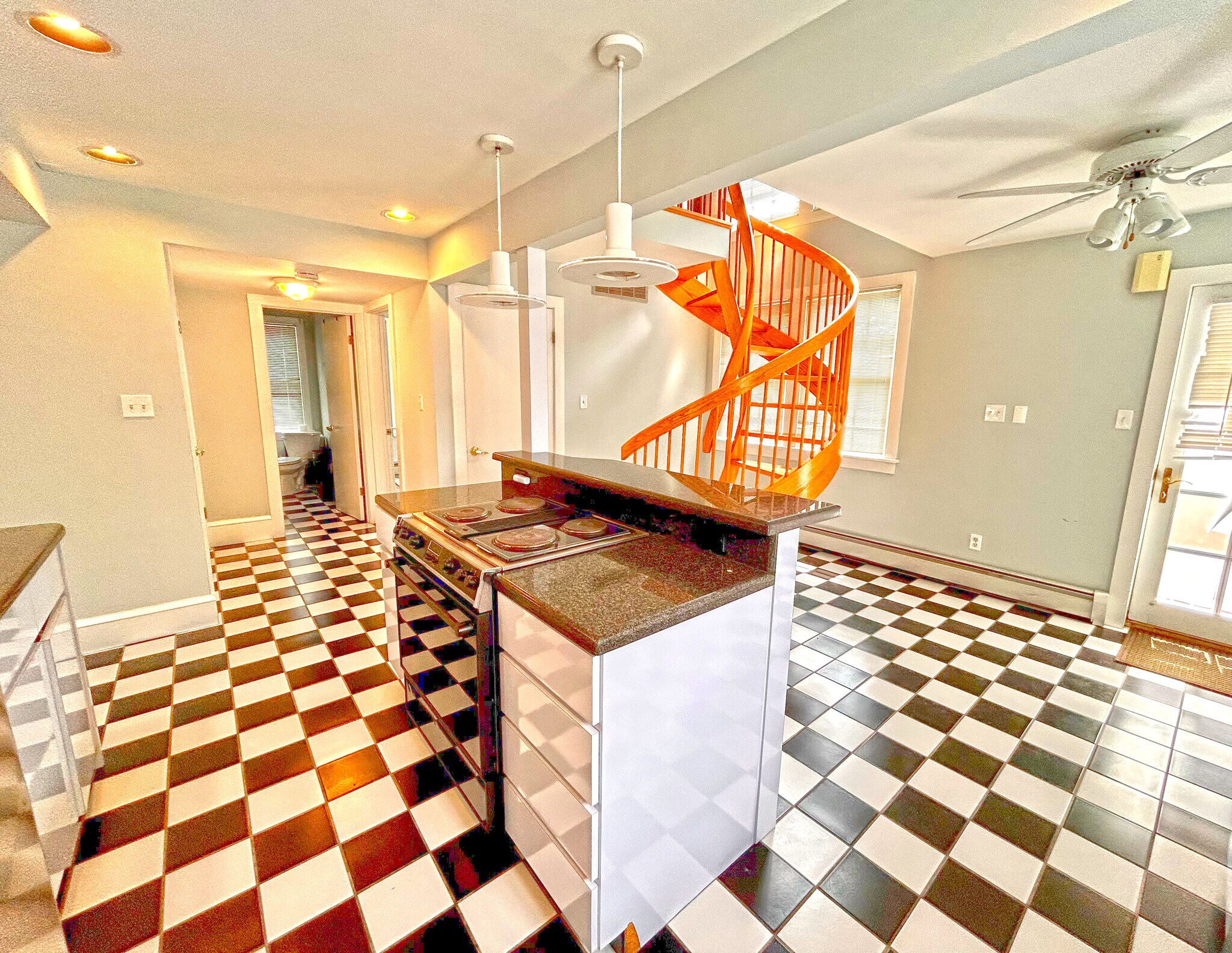 Kitchen with Spiral Stairs to 2nd Level - 18 Grove St