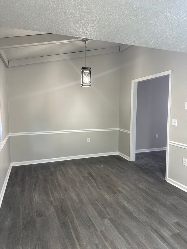 Building Photo - Recently Remodeled 4-Bedroom Home: Style a...