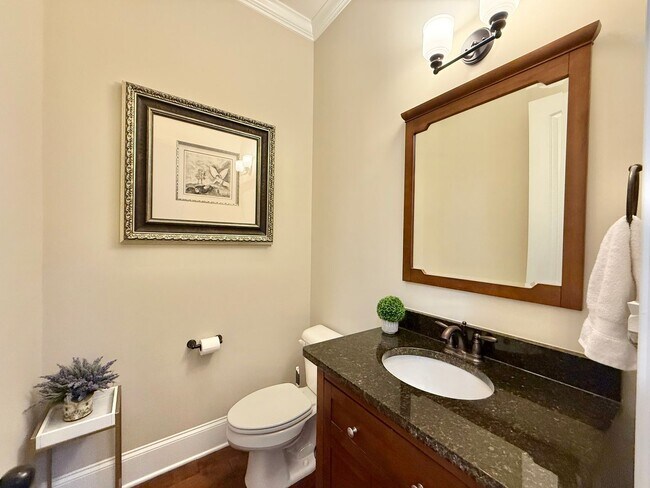 Building Photo - Luxurious 3BD, 4BA Raleigh Townhome with a First Floor Master Bedroom, Bonus Sunroom, and Large U...
