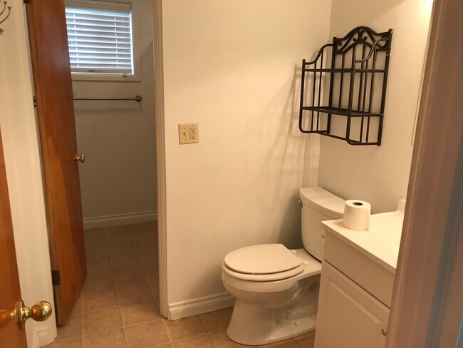 Main floor bathroom with separate tub shower area - 1202 9th St W