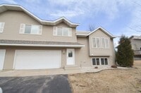 Building Photo - Spacious 3 Bed, 2 Bath Townhome with Attached Garage Available Now