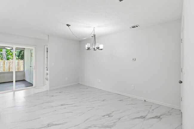Building Photo - PENDING APPLICATION-Newly Renovated 3-Bedroom Home in Emerald Lake Colony – Move-In Special!