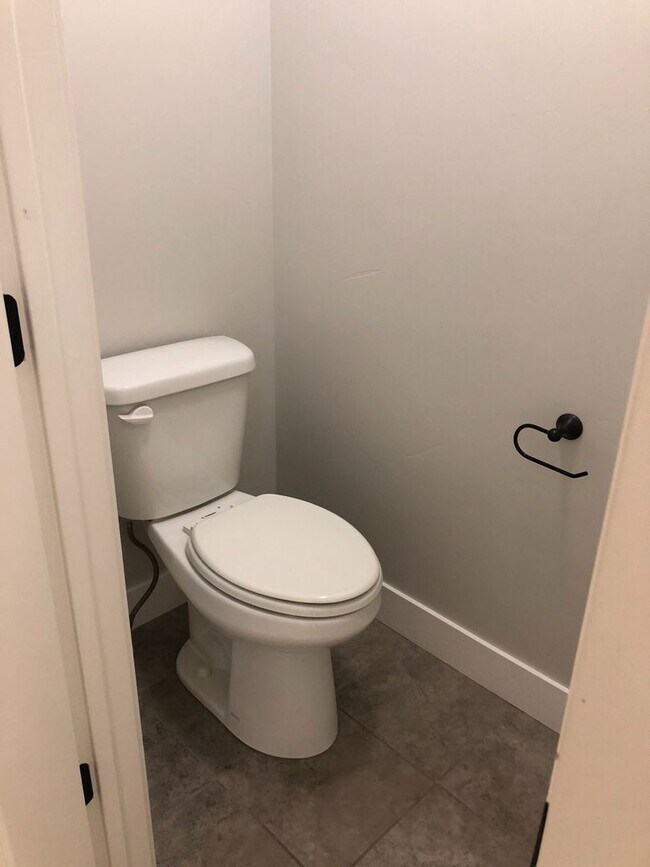 Building Photo - AMAZING HOME IN SOUGHT AFTER EXCHANGE DEVELOPMENT W/ 2 CAR GARAGE