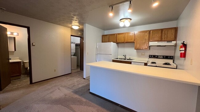 Building Photo - 1 Bedroom Condo in Independence Park w/Garage and Washer/Dryer! Call Today!