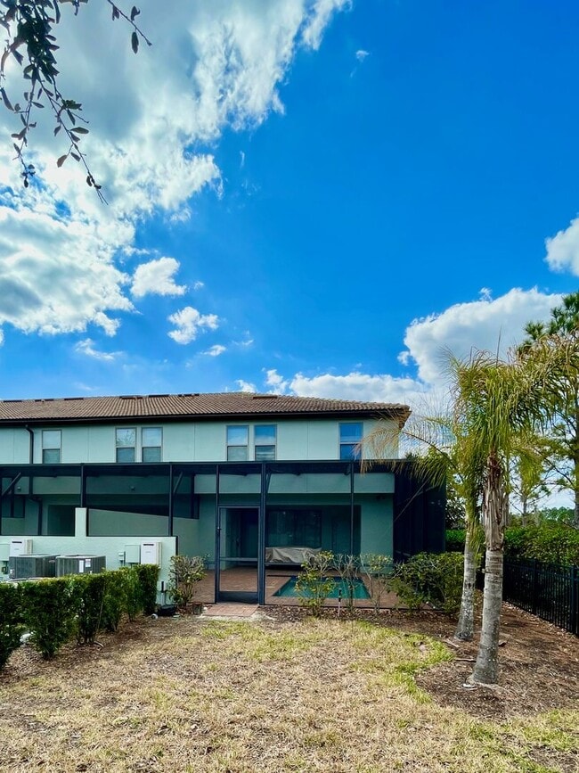 Building Photo - Spacious 5-Bed / 4.5-Bath Townhome w/ Private Pool & Sundeck in Gated Oakmont at Solterra Near Di...