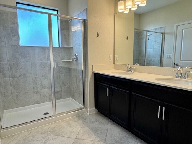 Building Photo - For Rent in ChampionsGate 3/2.5 Townhouse with Water View