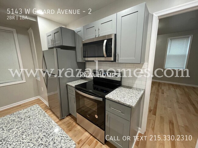 Building Photo - 5143 W Girard Ave