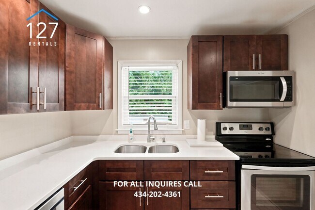 Building Photo - Spacious 4-Bedroom Single Family home with Large Backyard & Ample Storage