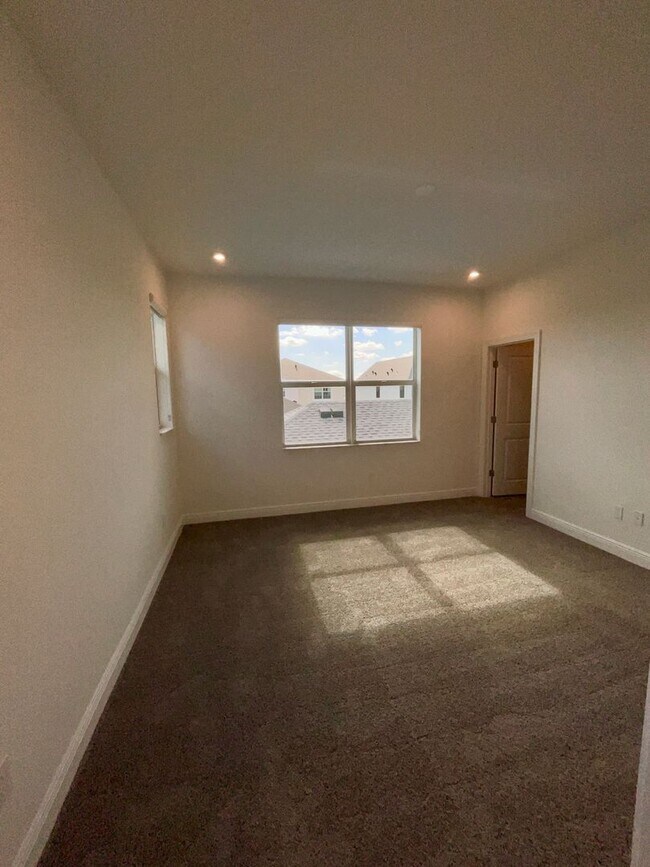 Building Photo - 3/2.5/2 Townhome in Rosette Park at Newfield