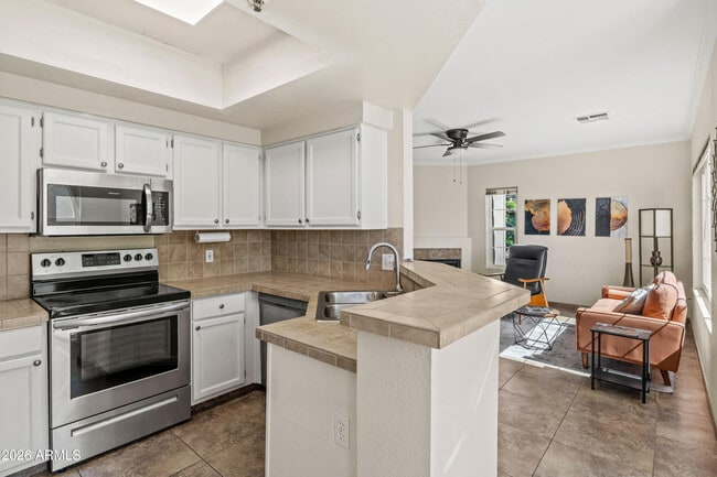 Building Photo - 9450 E Becker Ln