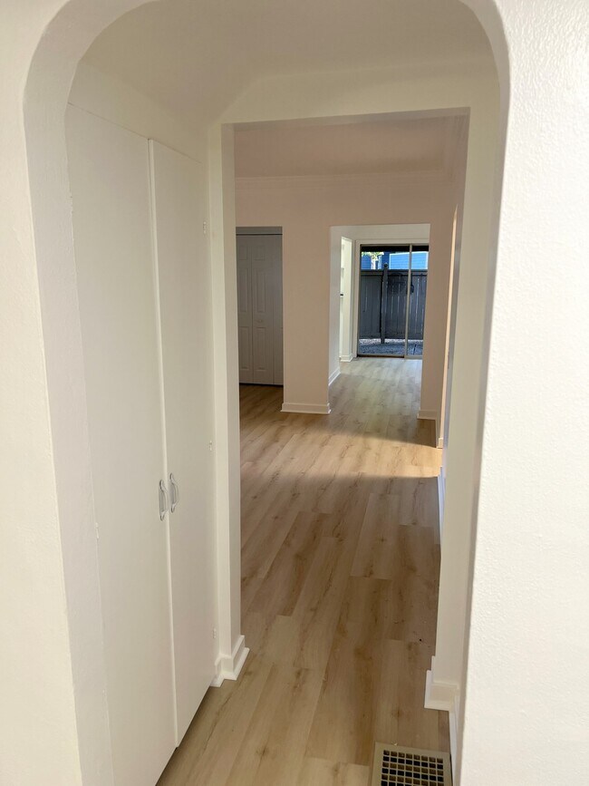 hallway from lower bedrooms and bathroom back to living room - 4662 Carman Dr