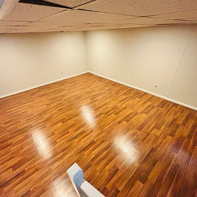 Building Photo - Spacious 3-Bedroom, 3-Bathroom Townhome with Finished Basement, Garage & Fenced Yard