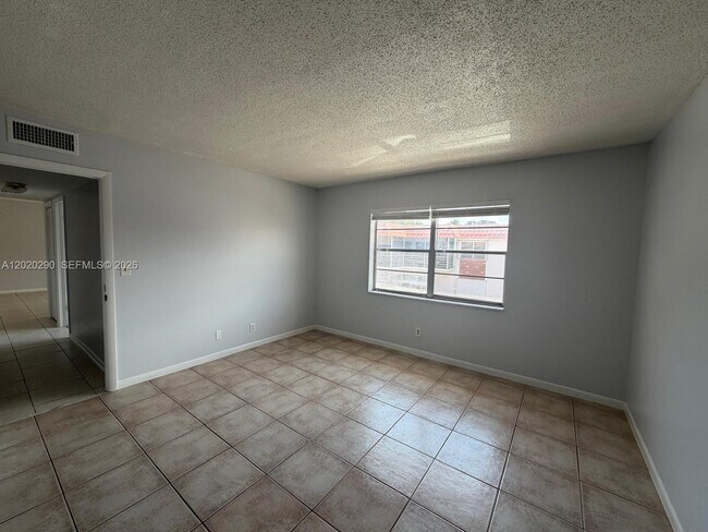 Building Photo - 3550 NW 8th Ave
